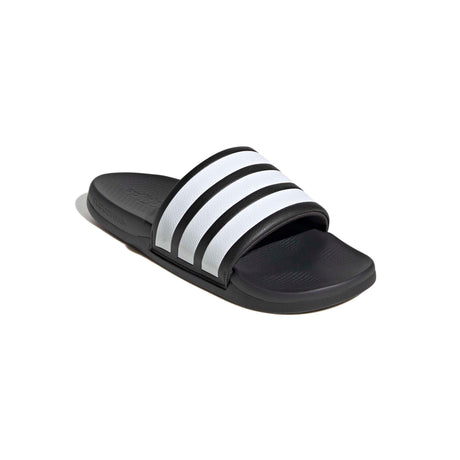 Black slide sandal with white stripes on a white background