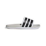 White slide sandal with black stripes on a white background