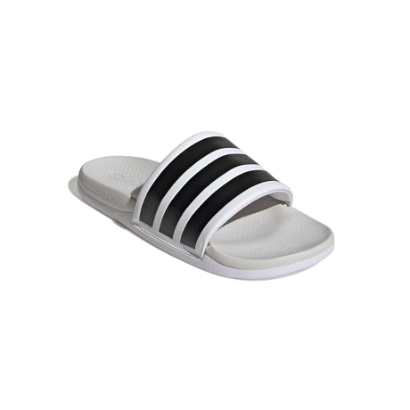 White slide sandal with black stripes on a white background