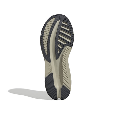 Close-up of a running shoe sole on a white background