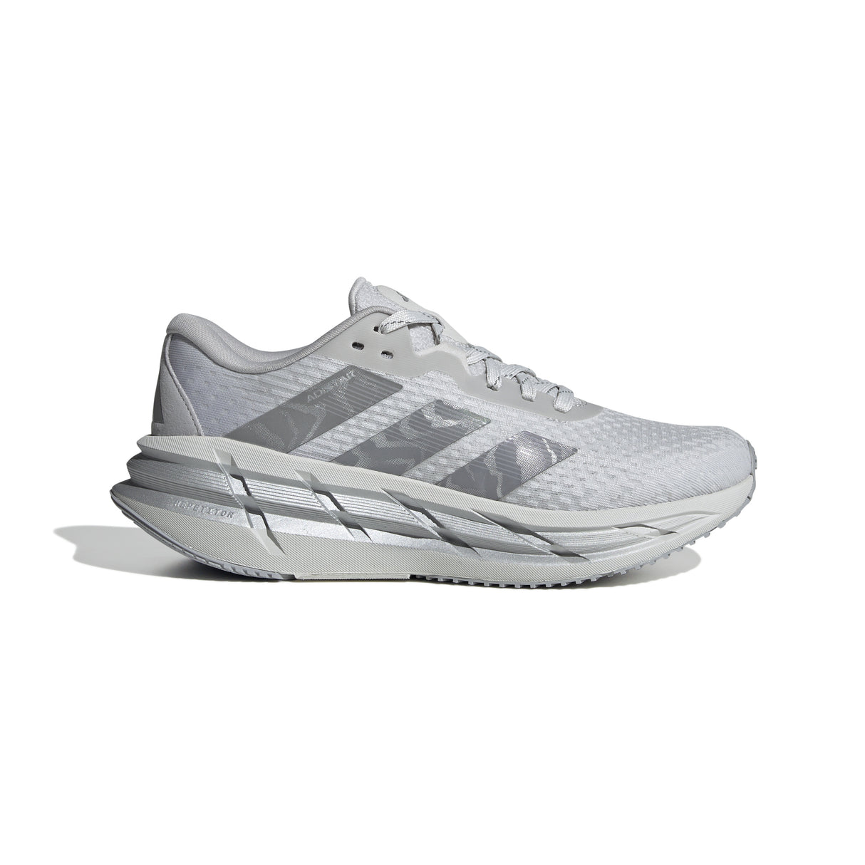 Grey running shoe with Adidas logo on a white background.  Can be purchased at www.sneakersplus.ca