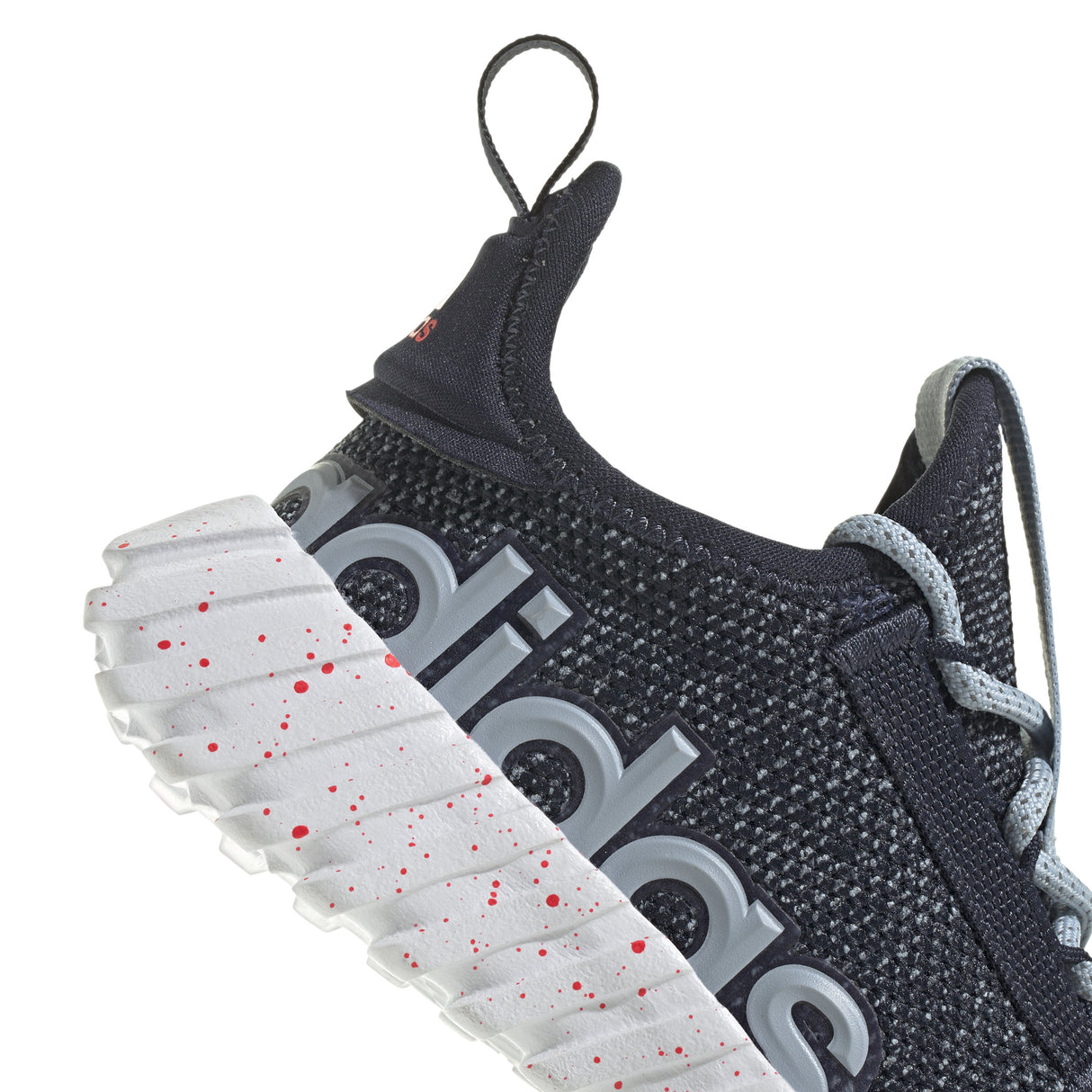 Black Adidas sneaker with white sole on a white background