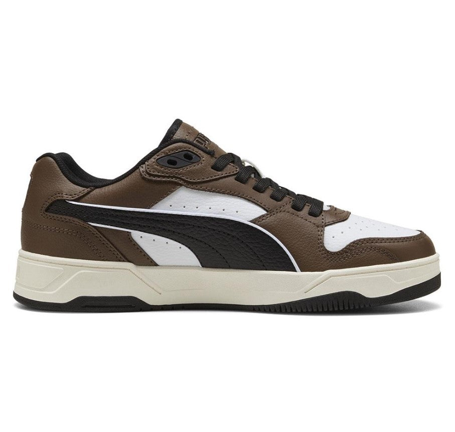 Brown, black, and white Puma sneaker on a white background.  Can be purchased at www.sneakersplus.ca