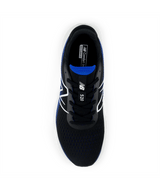 Black running shoe with blue sole on a white background