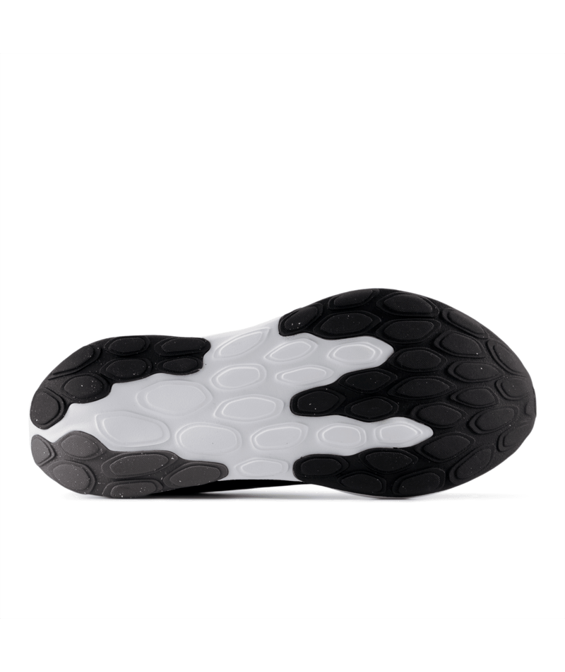 Close-up of a black and white shoe sole on a white background