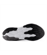 Close-up of a black and white shoe sole on a white background