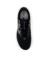 Black athletic shoe with brand logo on a white background