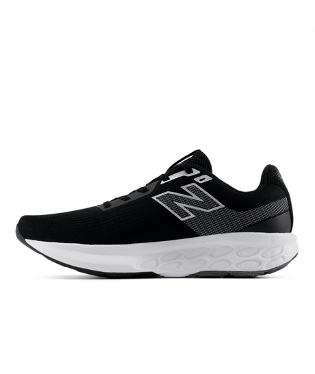 Black New Balance running shoe with white sole on a white background