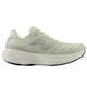 Light green running shoe with New Balance logo on a white background