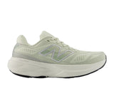 Light green running shoe with New Balance logo on a white background