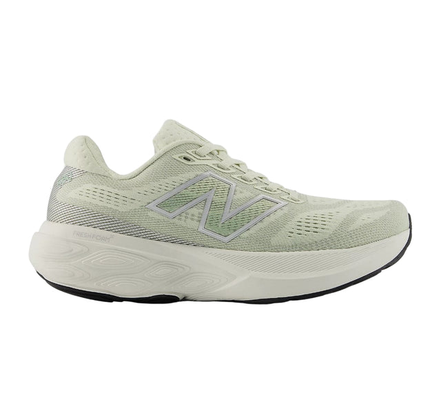Light green running shoe with New Balance logo on a white background