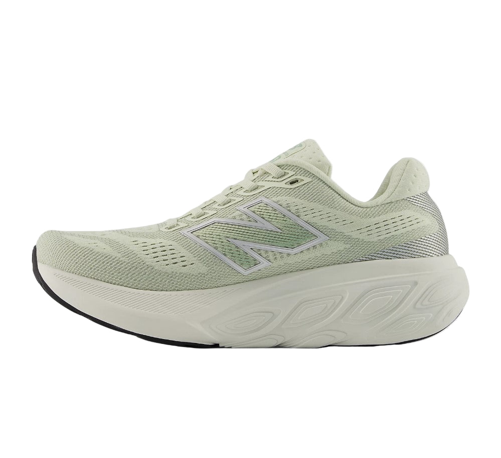 Light green running shoe with New Balance logo on a white background