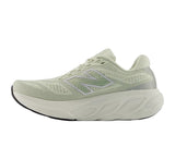 Light green running shoe with New Balance logo on a white background