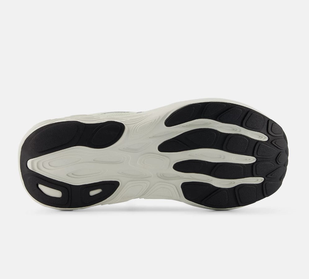 Close-up of a shoe sole with black and white pattern on a white background