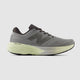 Gray New Balance 880 mens running shoe with a green sole on a light gray background.  Can be purchased at www.sneakersplus.ca  
