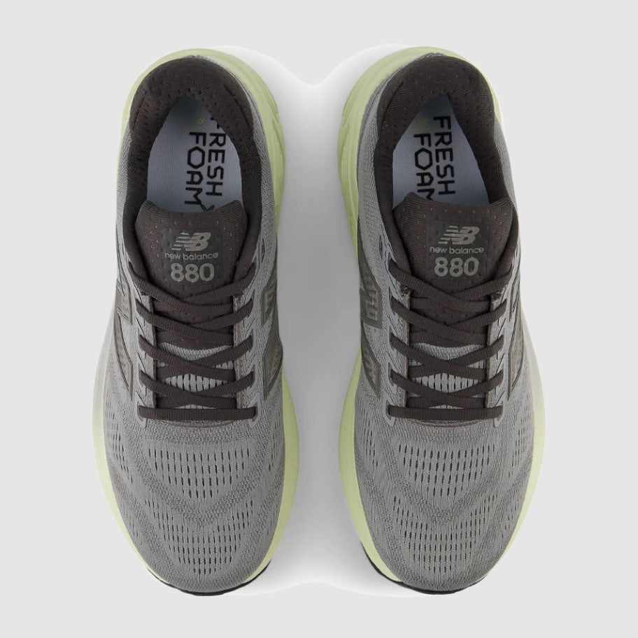 Gray running shoes with 'Fresh Foam' and 'New Balance' branding on a white background