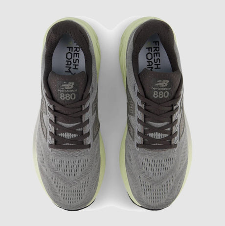 Gray running shoes with 'Fresh Foam' and 'New Balance' branding on a white background