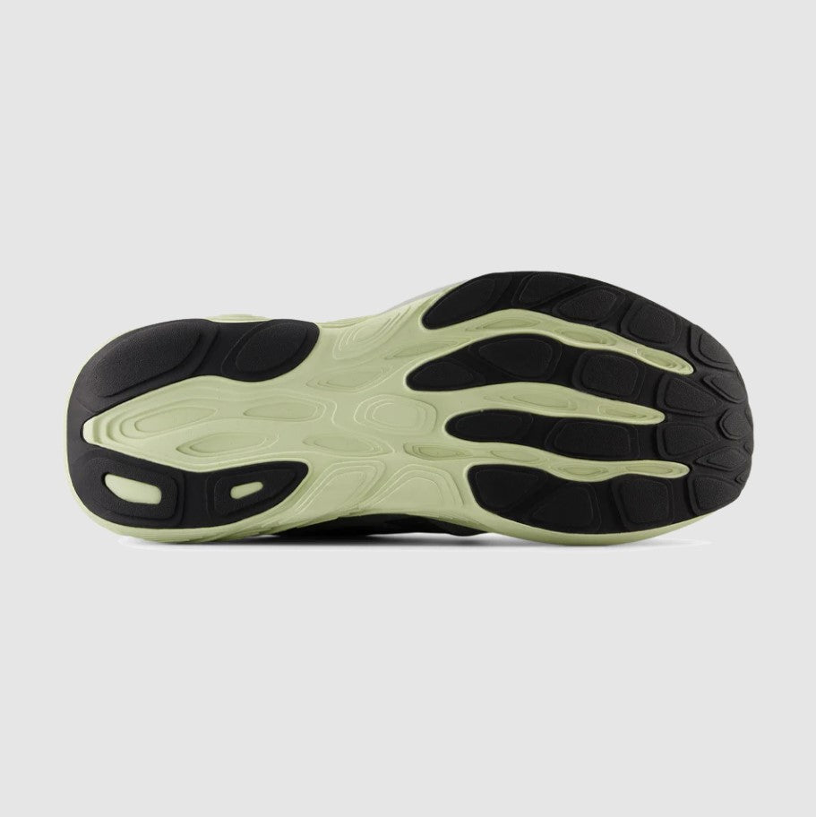 Sole of a shoe with a unique tread pattern on a light gray background