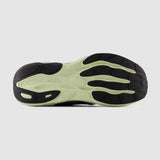 Sole of a shoe with a unique tread pattern on a light gray background