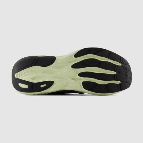 Sole of a shoe with a unique tread pattern on a light gray background