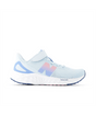 White running shoe with colorful 'N' logo on a white background.  New Balance kids running shoe.  Can be purchased at www.sneakersplus.ca