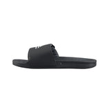 Black slide sandal on a white background