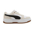 Beige and white Puma sneaker with a black accent on a white background.  Can be purchased at www.sneakersplus.ca