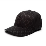 Black cap with subtle pattern on a white background