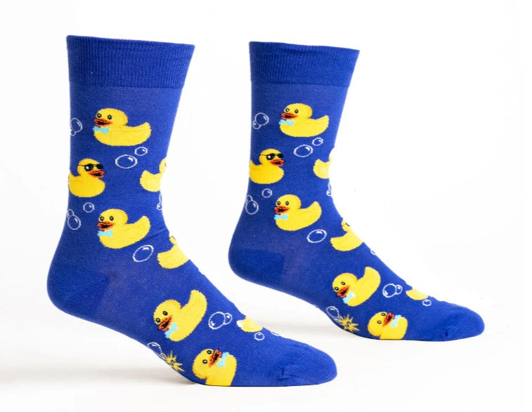 Blue socks with yellow rubber duck pattern on a white background