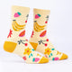 Colorful socks with fruit patterns on a white background