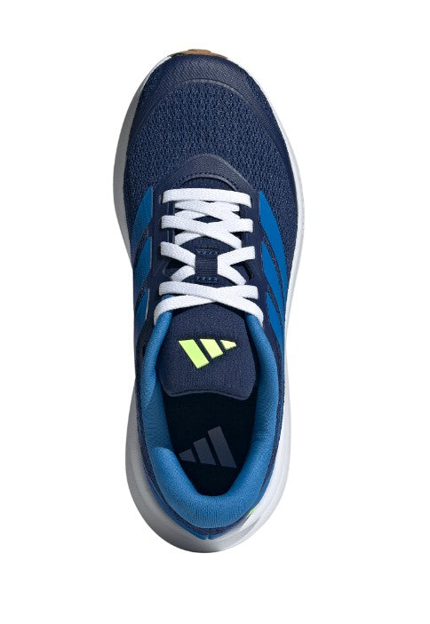 Blue running shoe with white laces on a white background