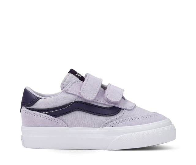 Purple and white sneaker with velcro straps on a white background