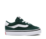 Green and white sneaker with a White sole on a white background