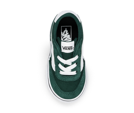 Green and white sneaker with Vans logo on the sole from a top down view on a white background