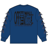 Blue long-sleeve shirt with 'Off The Wall' and 'Vans' branding on a white background