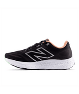Black running shoe with New Balance logo on a white background