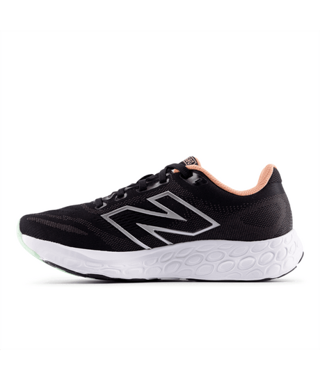 Black running shoe with New Balance logo on a white background