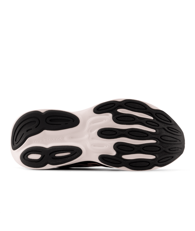 Close-up of a shoe sole with black and white pattern on a white background