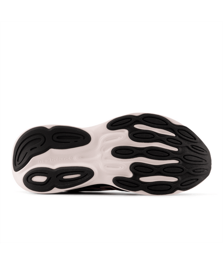 Close-up of a shoe sole with black and white pattern on a white background