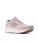 Pink running shoe with New Balance logo on a white background