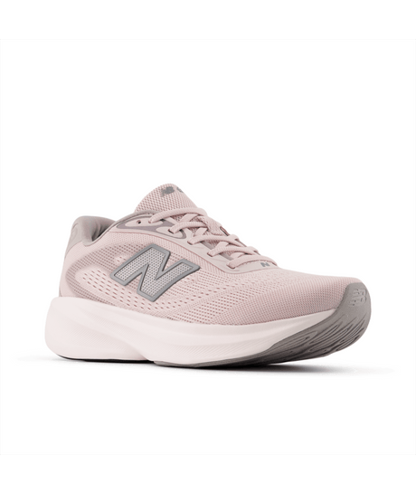 Pink running shoe with New Balance logo on a white background
