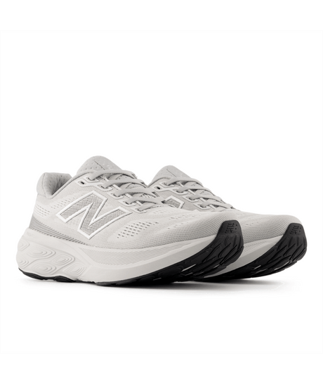 Gray running shoes with New Balance logo on a white background