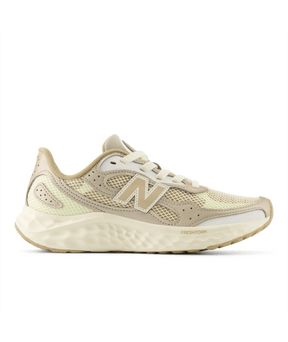 Beige sneaker with New Balance logo on a white background.  Can be purchased at www.sneakersplus.ca