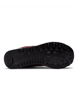 Close-up of a shoe sole with tread pattern on a white background