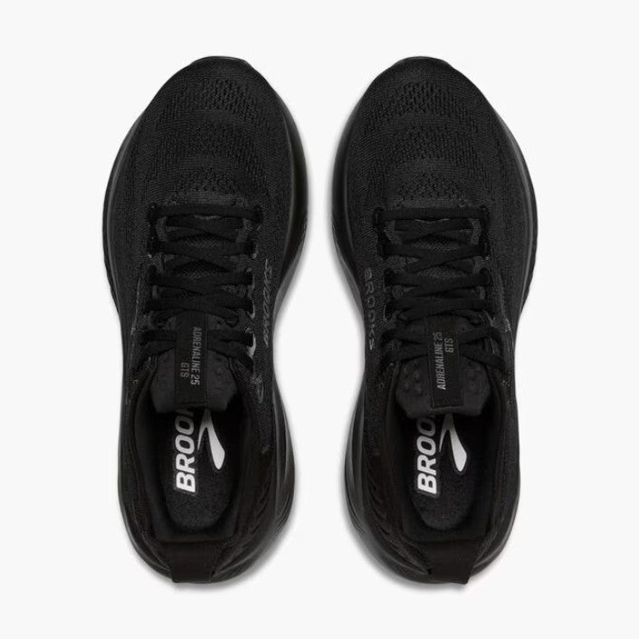 Black running shoes with 'Brooks' branding on a white background