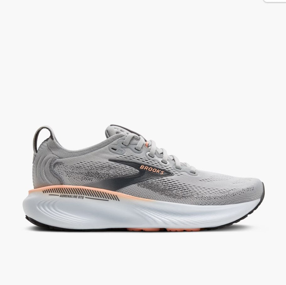 Gray running shoe with 'Brooks' branding on a white background