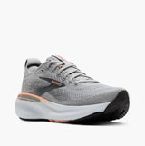 Gray running shoe with black sole on a white background