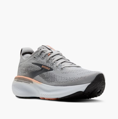 Gray running shoe with black sole on a white background