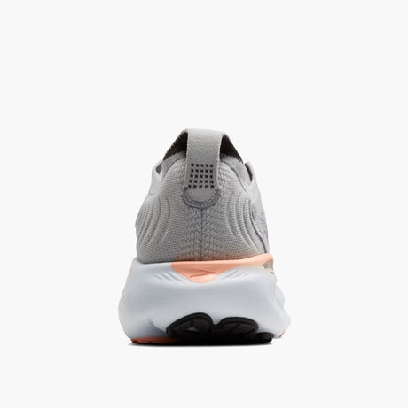 Gray and white sneaker with a black sole on a white background