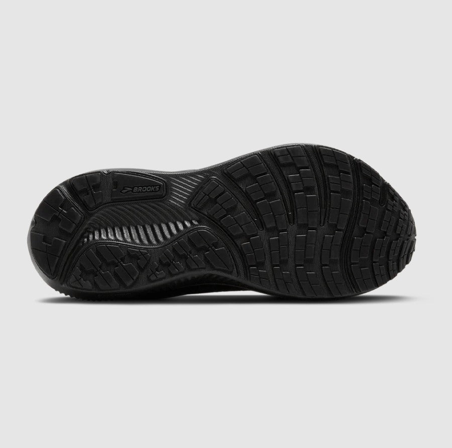 Black athletic shoe sole on a light gray background